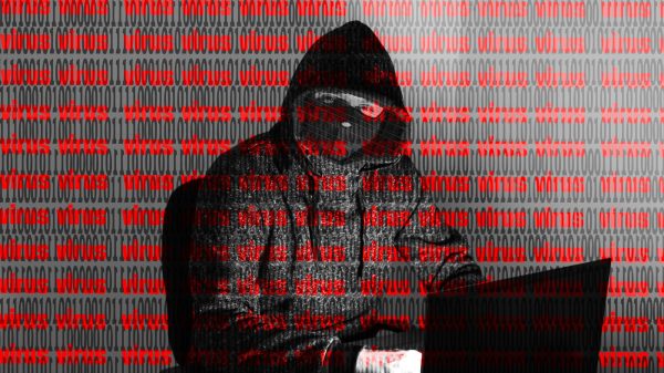 Illustration of a hacker breaching a website representing how websites get hacked article on Host Easy (Australian web hosting)